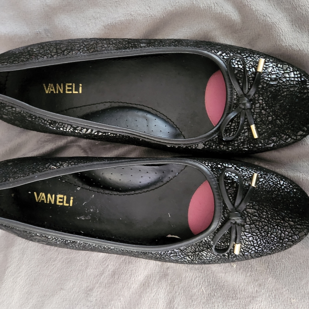 Black flats. Never worn. Size 11. Vaneli.